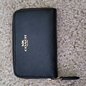 NWOT Coach mini zip up wallet.